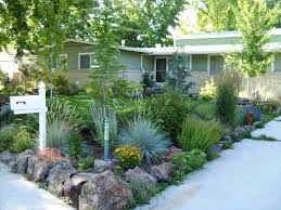 Stones make a wonderful mulch for a succulent garden design and also fit naturally into zen rock gardens. Landscaping Ideas For Front Yard Colorado Xeriscape Landscaping Small Front Yard Landscaping Water Wise Landscaping