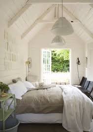 There are orange walls with grey furniture in the room, and this gives a unified look to the room. White Wood Paneling Design Ideas