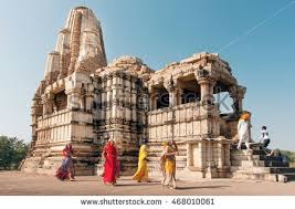 Khajuraho India Dec 24 Women In Indian Sari Dresses Watching Hindu Temples On December 24 2015 In Madhy Unesco World Heritage Site Indian Sari Dress India