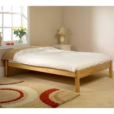 Copenhagen solid wood and upholstered bed. Baron Frame Bedknobs