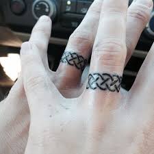 78 Wedding Ring Tattoos Done To Symbolize Your Love Ring Tattoo Designs Wedding Ring Finger Tattoos Tattoo Wedding Rings
