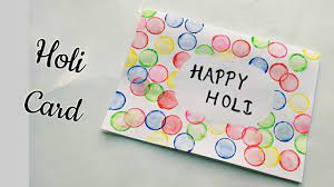 Creating greeting cards on holi can be a great way to wish your friends and family. Handmade Holi Card For Kids Bottle Cap Holi Painting Card Happy Holi 2018 Colorful Holi Card Making Youtube Holi Greeting Cards Happy Holi Holi Painting