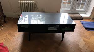 Then i got two whitewashed oak effect furniture panels from b&q and attached them to the top of the table using gripfill adhesive and gorilla wood glue. Dark Grey Brown Glass Top Ikea Coffee Table In Nw3 London Fur 70 00 Zum Verkauf Shpock De
