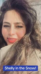 Shelly Tumbling Down A Snow Hill