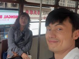 Today was a really happy day. In the morning, we wore matching white  jackets and started our trip. We took photos in front of the mirror, waving  and laughing together. Our first