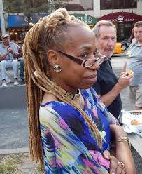 They better sit down and look around Who's that girl side to our queen ?