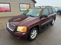 Image result for Medium Red 2002 Envoy