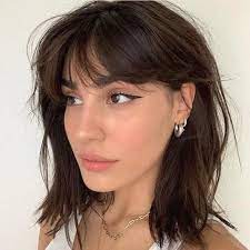 Between choppy layers and curtain bangs, this hairstyle is boho at its best. Pin On Big Southern Hair