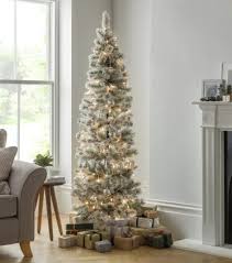 25 Slim Christmas Trees For Small Spaces Pencil Christmas Trees You can pick a slim cedar tree with clear lighting or a dual colored led fir model. slim 6ft pop up snowy artificial christmas tree