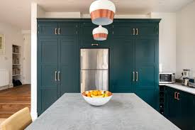 This prevents the room from looking too gloomy. Reigate Kitchen Herringbone Kitchens
