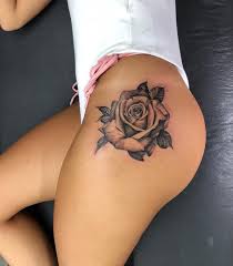Female roses with rosary tattoo on the leg #47. Black Rose Tattoo Hip Tattoo Designs For Women