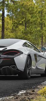 Novitec mclaren 570s spider 2018 wallpaper for iphone 6. Mclaren 570gt White Supercar Back View Road Trees 1080x1920 Iphone 8 7 6 6s Plus Wallpaper Background Picture Image