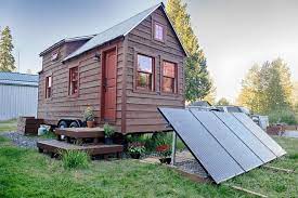 Rustic Exterior By The Tiny Tack House Shed To Tiny House Tiny House On Wheels Small House