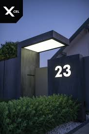 Dark Monolith Modern Fence Rockina Cubero Plates Arete Vertico Slats And Arete Pure Gates Fenceide Moderne Aussenturen Modernes Zaun Design Moderner Eingang
