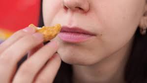 Chicken nuggets are a favorite american snack, and they are surprisingly easy to make. Woman Eats Chicken Nuggets Harmful Stock Footage Video 100 Royalty Free 1029682982 Shutterstock