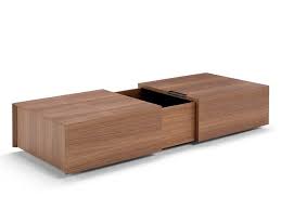 This top has a cross in the middle and additional pieces that make up the rest of the table. Multi Layer Wood Coffee Table With Storage Space Slide By Amura Design Emanuel Gargano