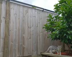 Oscillot is a system of cat proofing that is attached to the top of an existing fence that will keep the owner's cat in and other cats out. Oscillot Proprietary Ltd Spinning Paddle Cat Proof Fence System