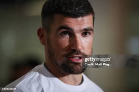 Andrew Redmayne arrives at Sydney International Airport