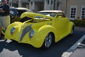 A Yellow Convertible Antique Cars Convertible Car