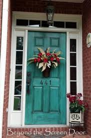 To give your beige exterior a more sophisticated feel, try painting the shutters and front door black. A Collection Of Turquoise Doors Sonya Hamilton Designs Turquoise Door Painted Front Doors Teal Front Doors