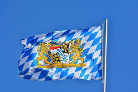 These symbols include flags, coats of arms, national animals and birds, and others. Blue White Checkered Flag Lions Shield Insignia Waving Wind Flag Bavaria Bavarian Flag Pxfuel