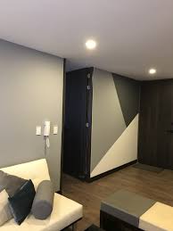 The Gray Scale Color Pallet In This Room Is Very Harmonious As Are The Harsh Angles And Sharp Edges Bedroom Wall Designs Bedroom Wall Colors Bedroom Wall Paint