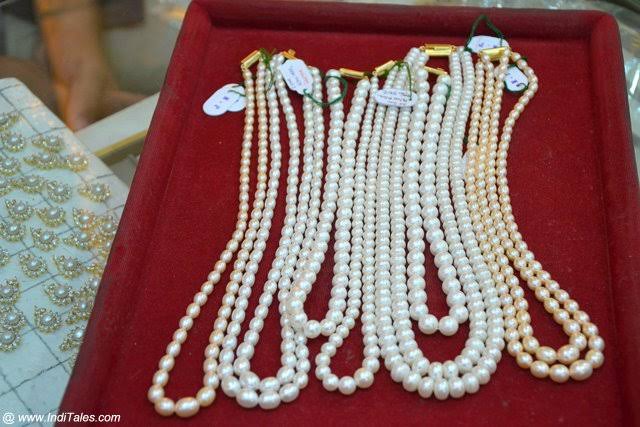 Lustrous pearl strands on display in Hyderabad, AI generated