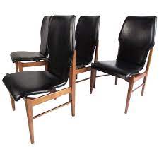 Add extra seating with a contemporary flair by choosing a bench for your dining room. Mid Century Set Of High Back Dining Chairs Dining Chairs High Back Dining Chairs Plastic Dining Chairs