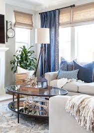 Coastal Family Room Blue And White Pillows Gray Walls Roman Shades Axis Sectional Coastal Decorating Living Room Living Room Color Coastal Living Rooms