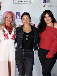 Madison lee de la garza (born december 28, 2001) is an american actress. Meet Amber Lovato Demi Lovato S Sibling Sister Photos And Facts Glamour Path