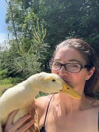 Is this normal for my duck to walk hunched over? If not what's going on?  New duck mom.