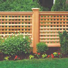 For improving the drainage for your lattice fence, apply 2 of crushed stone to the post holes' bottom. How To Build A Wood Lattice Fence This Old House