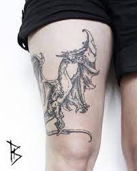 Mix and match design elements from this and other design sheets to create endless possibilities of tattoo designs from small to. Medieval Dragon Tattoo On The Thigh Tattoogrid Net