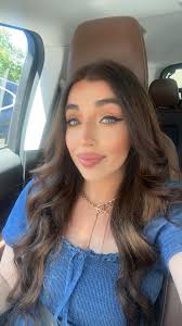 Can someone create a professional headshot with a blazer?