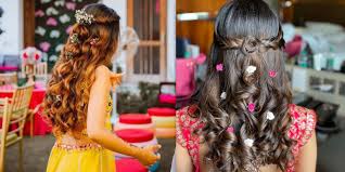 The style is versatile enough to be able to wore to any occasion. Easy Half Updo Hairstyles For That Dreamy Mehndi Look Wedmegood