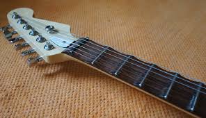 It was after playing two different guitars that i realized that the tone of the guitars were much different due to the length of. Carved Fingerboard Between Frets On A Guitar Music Practice Theory Stack Exchange