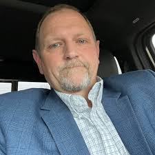 What was the name of the barber in Columbia County, Arkansas?