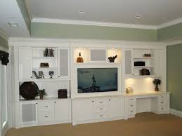 17 Diy Entertainment Center Ideas And Designs For Your New Home Enthusiasthome Built In Entertainment Center Built In Desk Desk Wall Unit