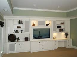 Here's how give an old entertainment center a makeover, what kind of paint to use on wood furniture and how to paint furniture without sanding. 17 Diy Entertainment Center Ideas And Designs For Your New Home Enthusiasthome Built In Entertainment Center Built In Wall Units Desk Wall Unit
