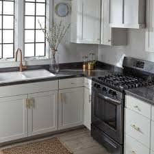 white cabinets black countertops