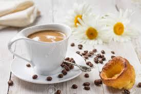 Our daisies ceramic coffee mugs come in two sizes (11 oz. A Cup Of Hot Coffee With Yorkshire Pudding And Daisies On A White Wooden Background Breakfast Stock Photo Picture And Royalty Free Image Image 106282424