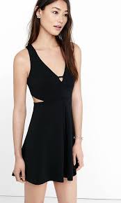 Black Cut Out Fit And Flare Dress From Express Wear Fit Flare Cocktail Dress Dresses Black Flare Skirt
