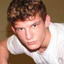 Fighting champ critical after encounter with police