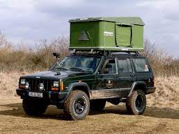 Jeep Xj With Maggiolina Roof Top Tent Jeep Tent Jeep Xj Jeep