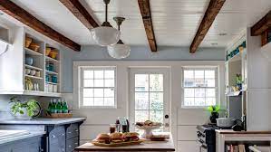Originally between the two steal beams there was a super low drop down ceiling and i hated how cave like it made that part of the basement feel. 5 Ideas For Faux Wood Beams This Old House