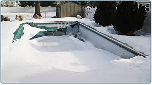 Putting a winter cover over your swimming pool will keep the water clear during the winter period. Dealing With Snow On Your Winter Pool Cover Intheswim Pool Blog