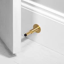 You can add a handle of a leather strip to it. Door Stop Wall Brass Buster Punch Hardware