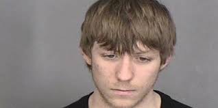 Man accused of selling heroin in North Utica parking lot