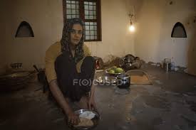 Maybe you would like to learn more about one of these? Indian Woman Sitting In Kitchen And Cooking Food On Firewood With Utensils Vegetables People Stock Photo 213712600