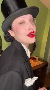 In an authentic 1920s mens suit in a 1920s apartment with 1930 Art Deco  furniture. Almost 🤷🏻‍♀️